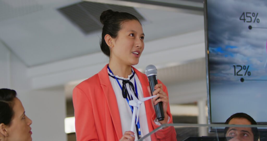 female speaker addressing the audience at a business conference sbi 351036760